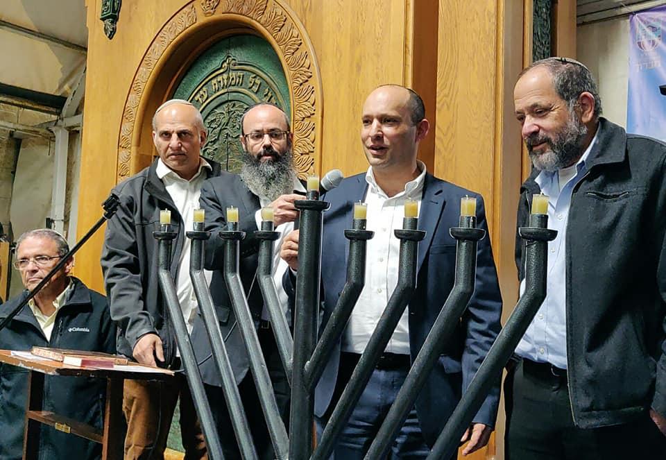 Naftali Bennett Lights Hannukah Candles in Hebron