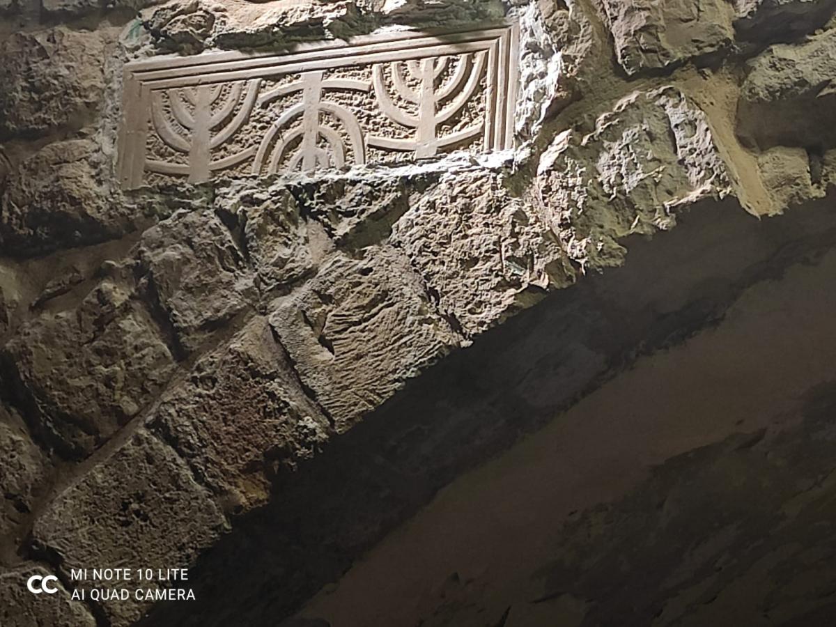 Historic menorah artifact replaced in Hebron